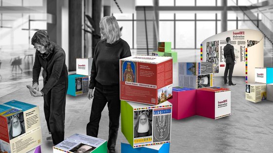 Menschen beim Aufbau einer Ausstellung